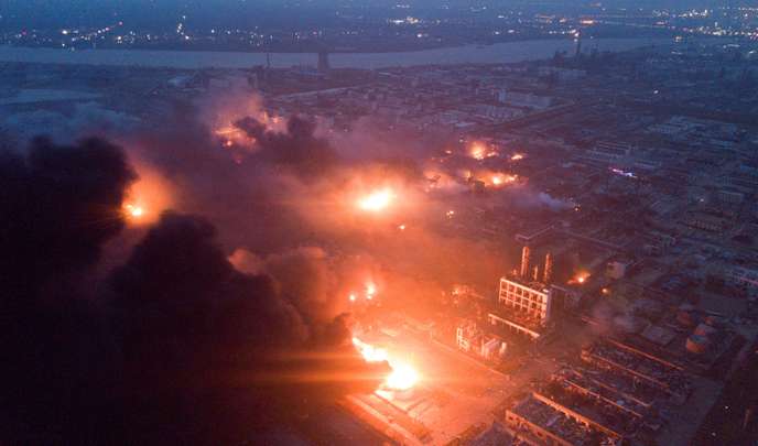 Smoke billows from fire following an explosion at the pesticide plant owned by Tianjiayi Chemical, in Xiangshui county, Yancheng, Jiangsu province, China March 21, 2019. Picture taken March 21, 2019. REUTERS/Stringer  ATTENTION EDITORS - THIS IMAGE WAS PROVIDED BY A THIRD PARTY. CHINA OUT.