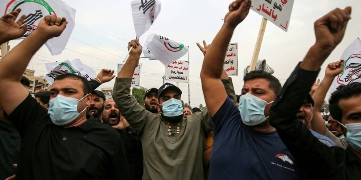 Les Irakiens pro-Iran qui criaient mort à l'Amérique saluent l'élection de Biden